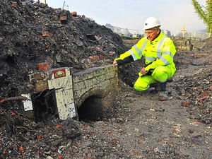 Supporting image for story: Riverbank works uncover ruins of homes from Shropshire landslip disaster