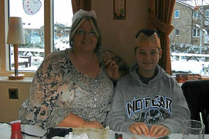 Julia Jones with her son before she lost over nine stone