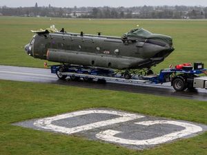 Supporting image for story: Legendary RAF helicopter that survived missile attack in Falklands War arrives at Cosford
