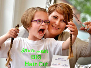 Supporting image for story: In pictures: Plait's the way to do it, as Market Drayton youngster loses tresses for charity