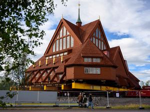 Supporting image for story: Swedish church sets off on three-mile road trip to new city centre