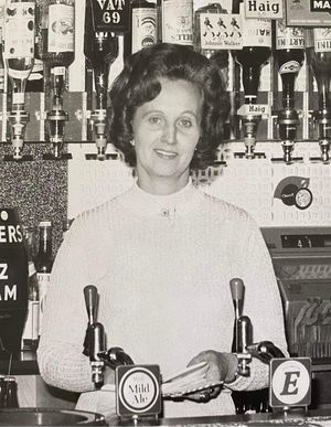 Doreen Bunce behind the bar