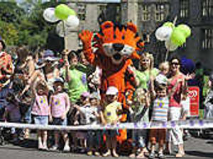 Supporting image for story: Families step out at castle for charity walk