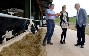 Mr Corbyn with farm manager Scott Kirby and researcher Gemma Charlton