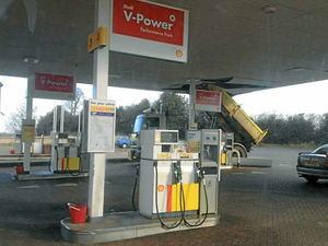 Supporting image for story: Petrol station damaged as tipper truck hits roof