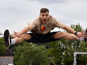 Supporting image for story: Watch: Acrobat leaps over Sedgley councillor as residents enjoy fun day in the town
