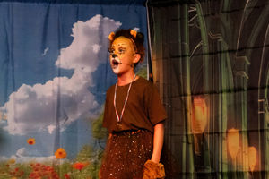 Liliana Skarzynska as The Cowardly Lion. Photo by Love and Luminosity Photography.