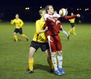 Ellesmere's Josh Parker and Wem's Dan Price.
Elesmere in yellow