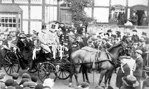 nostalgia pic. Claverley. Only information with this postcard is 'Claverley' written on the back. There is another postcard of the same people on presumably the same occasion showing a team of men pulling the carriage. Date may be about 1912. Possibly the couple in the carriage were newly-weds of some prominence locally returning maybe from honeymoon. That's conjecture of course. Picture loaned by Bridgnorth postcard collector Ray Farlow, who is happy for his pix to be ordered. AFTER PUBLICATION C. EARLY JUNE 2010 WE HAD FOLLOWING FEEDBACK:PICTURE: This picture has now been identified as a honeymoon homecoming almost 100 years ago. Colonel Legh (CORRECT) is in the lighter suit, just to the right of the man in a bowler hat.PICTURE B: How the homecoming was reported by the Bridgnorth Journal.We were at a loss to explain what was going on here when we carried this photo in Pictures From The Past, but now Claverley Memories Local History Society has come up trumps.\It's the homecoming of the Honourable Stratford Tollemache and his bride, who was formerly Miss Ethel Cavendish of Chyknell in Claverley,\ said society chairman Mrs Sue Burns.\The couple had married on Valentine's Day in 1912 and were returning from their honeymoon. Their horse and carriage was drawn to the Bull Ring, which is where the picture was taken, and then the carriage was unhooked and some estate workers and some guests took over. It was organised by Colonel Legh (CORRECT LEGH). His wife was the sister of Mrs Tollemarche.\When they got to Chyknell there was a celebration with estate workers and everyone joining in.\The occasion was reported in the Bridgnorth Journal. Stratford Tollemache was the son of the first Lord Tollemache, of Helmingham Hall, Suffolk, and Peckforton Castle, and Ethel was daughter of the late Henry Cavendish of Chyknell. They wed at All Saints' Church in Claverley.Their homecoming from a honeymoon spent at Fawsley Park and Helmingham Hall was on Wednesday, March 13,