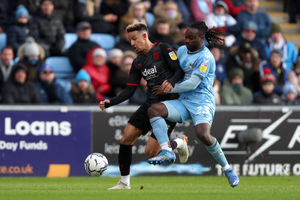 Callum Robinson of West Bromwich Albion and Fankaty Dabo of Coventry City. (Photo by Adam Fradgley/West Bromwich Albion FC via Getty Images).