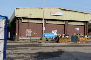 The former Wednesbury Leisure Centre which is being knocked down. Fire damage can be seen on the roof.
