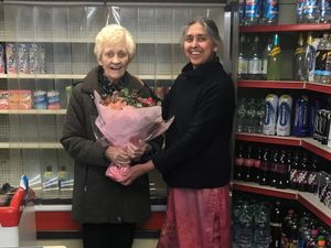 Supporting image for story: Newsagent spreads the love by handing out rose bouquets to community members 