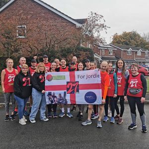 Lewis after his seven half marathons in seven days last year with supporters in Cannock and family of his dear friend Jordan Pilkington