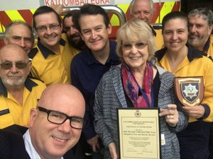 Pauline Dee (centre) with Blue Mountains Mayor Mark Greenhill and volunteers from Katoomba/Leura Rural Fire Service Brigade.