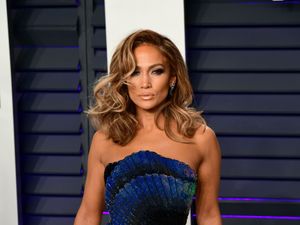 Supporting image for story: Jennifer Lopez and Ben Affleck cuddle up in picture from Leah Remini’s birthday