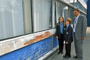 Burton Borough School in Newport is to be given funding for new buildings. With the current Art block which is due to be demolished are pupils from left, Ellen Taylor and Josh Priday, both 12 with Head Teacher David Hill