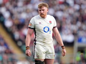 Ollie Chessum in action for England