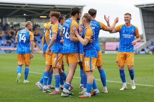 Will Boyle of Shrewsbury Town celebrates with his team mates after scoring a goal to make it 2-0
