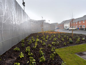 Supporting image for story: Fencing is installed around homes close to ‘hazardous’ site