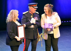 Melissa Bentley and Vicky Mitchell share a joke with the Lord Lieutenant as they accept Cresswell Wanderers award