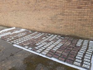 Supporting image for story: Four men charged after 500kg of cocaine seized in car park.