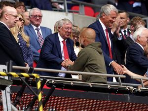 Sir Alex Ferguson greets Manchester City manager Pep Guardiola following the 2023 FA Cup final at Wembley