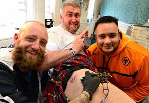 Jonathan Green at the Tattoo Palace, in Chapel Ash, Wolverhampton, with tattooist Dan Ball and Dave Anson
