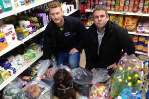 Yoyo with Trading Standards officer Arron Good, left, and handler Stuart Philips from B.W.Y Canine