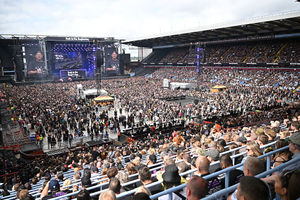 The Villa Park crowd watch support acts, during British rock band Black Sabbath's "Back to The Beginning" concert, Ozzy Osbourne's final ever gig as Black Sabbath's frontman at Villa Park in Birmingham, central England on July 5, 2025. Osbourne, who revealed in 2020 that he has Parkinson's disease, will join Tony Iommi, Geezer Butler and Bill Ward for the all-day "Back To The Beginning" show in Birmingham, central England, where the heavy metal giants formed in 1968. (Photo by ANDY BUCHANAN / AFP) (Photo by ANDY BUCHANAN/AFP via Getty Images)          