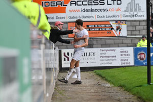 Oliver Cawthorne runs off the celebrate with the fans