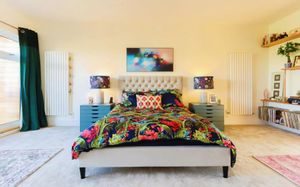 A second bedroom lit up through large windows. Picture: Purplebricks