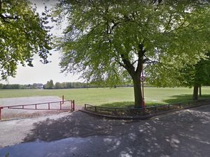 Supporting image for story: Travellers set up camp on land near Commonwealth Games stadium