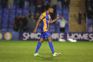 Mal Benning of Shrewsbury Town celebrates after scoring the winning penalty (AMA)
