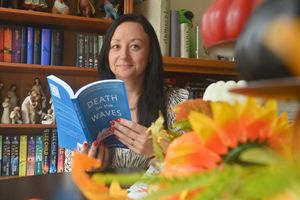 Kerrie with her book Death on the Waves
