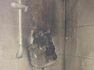 Supporting image for story: Woman suffers smoke inhalation after Halesowen shower blaze