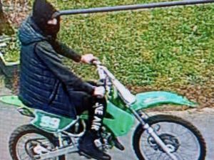 Supporting image for story: Hunt for hooded biker on distinctive green machine is launched by police