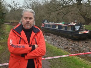 Supporting image for story: Whitchurch canal collapse: 'Everything we've got is on that boat' says artist left in limbo with his family's home perched on breach's edge