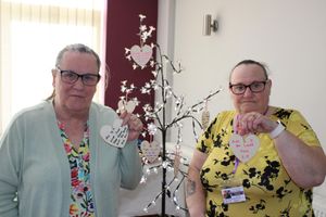 Residents at Manor Farm Community Association wrote messages on wooden hearts to place on a memory tree.