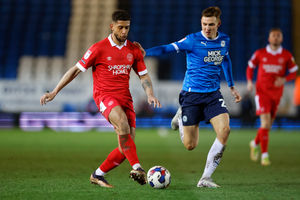 Rekeil Pyke of Shrewsbury Town and Hector Kyprianou of Peterborough United (AMA)