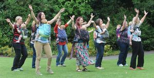 The group celebrates their milestone in Bantock Park