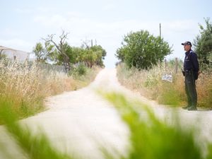 Supporting image for story: Madeleine McCann: Latest search sees teams drain well and clear dense vegetation