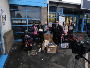 Stu 'Goldcrusher' Goldsmith with Krishan Singh, councillors    and representatives of the ROyal Wolverhampton NHS Trust's charity Your