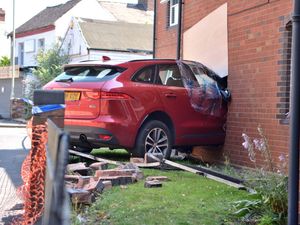 Supporting image for story: Luxury car remains at scene day after smashing into Telford home