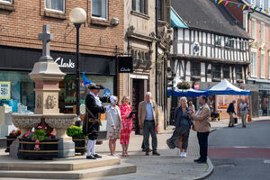 The town crier welcoming the judges