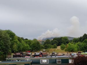 Supporting image for story: Hillside blaze re-ignites as firefighters battle flames into fourth day