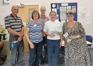 Organiser Linda Lade with Kim Bebbington from iCan surrounded by attendees David Hardwick, Henry Thomas and Su Norris 