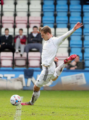 Adam Farrell of AFC Telford United scores a goal.