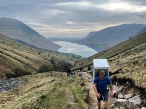 Supporting image for story: Former soldier climbs 15 mountains in less than a year – with a fridge strapped to his back