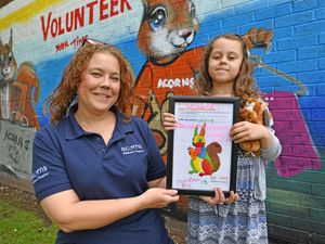 Supporting image for story: Hospice shop art competition winner paints a pretty 'Oakly' picture for customers