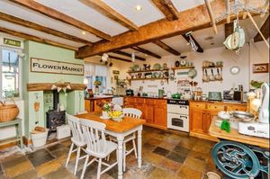 The character kitchen is attractive and well-appointed
